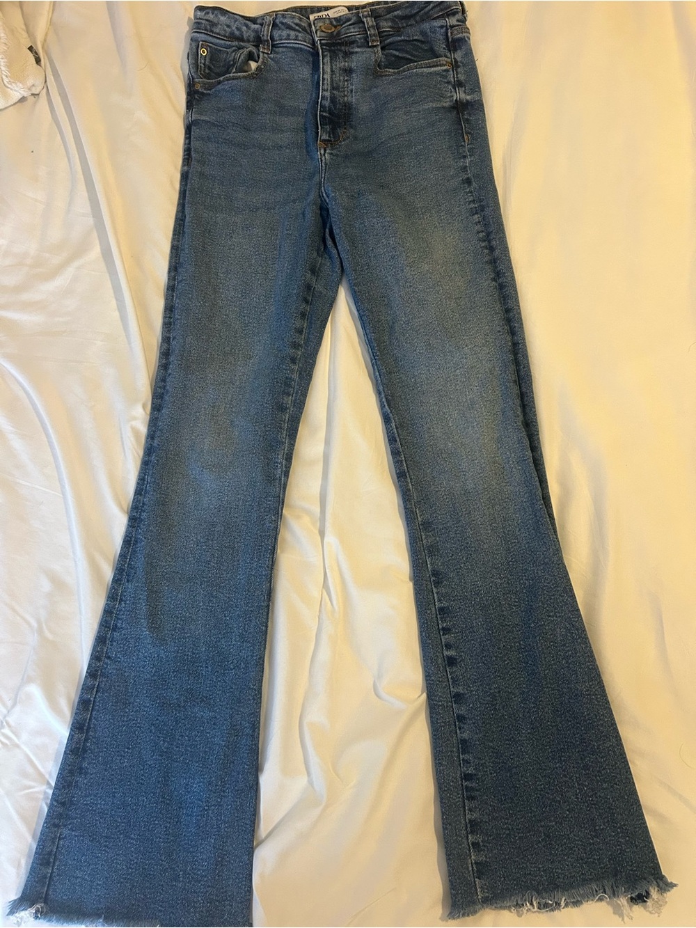 Zara Dark Blue Flared Jeans with Raw Hem
